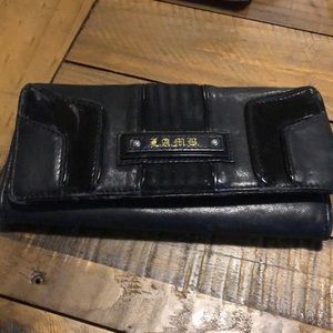 Gwen Stefani wallet blacks and white